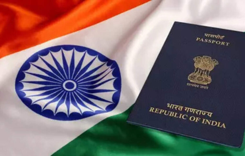 Indian e-passport with gold RFID symbol and embedded chip displayed on a table, highlighting next-gen technology